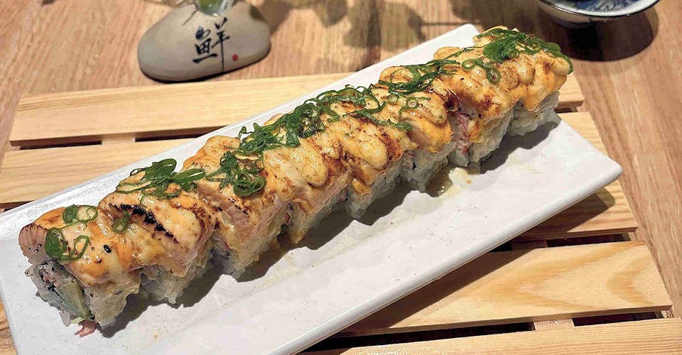 Seared Salmon Maki (10 Pieces) from Dodomi Sushi Rotary - N Sheridan Rd in Chicago, IL