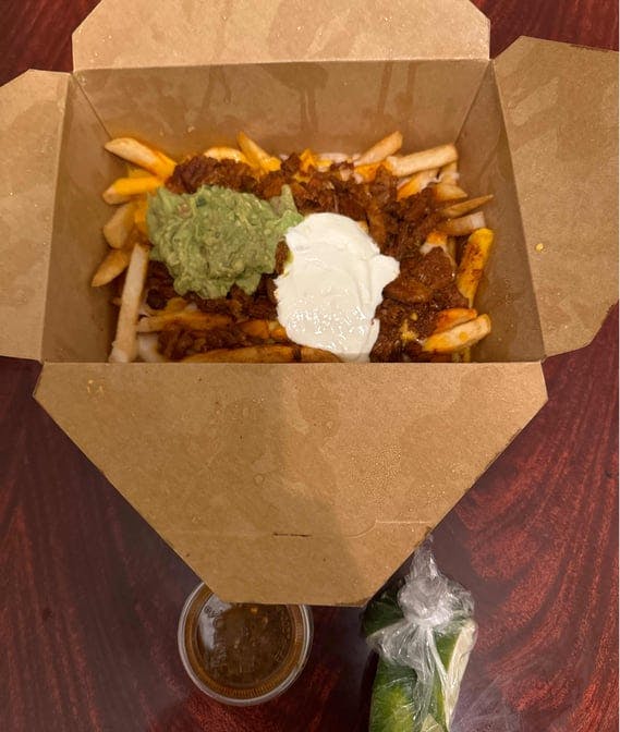Al pastor french fries from Tacos La Calle - Beach Blvd in Buena Park, CA