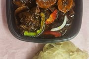 Roti w/oxtail stew from Taste of the Caribbean 1 - Capitol Heights in Capitol Heights, MD