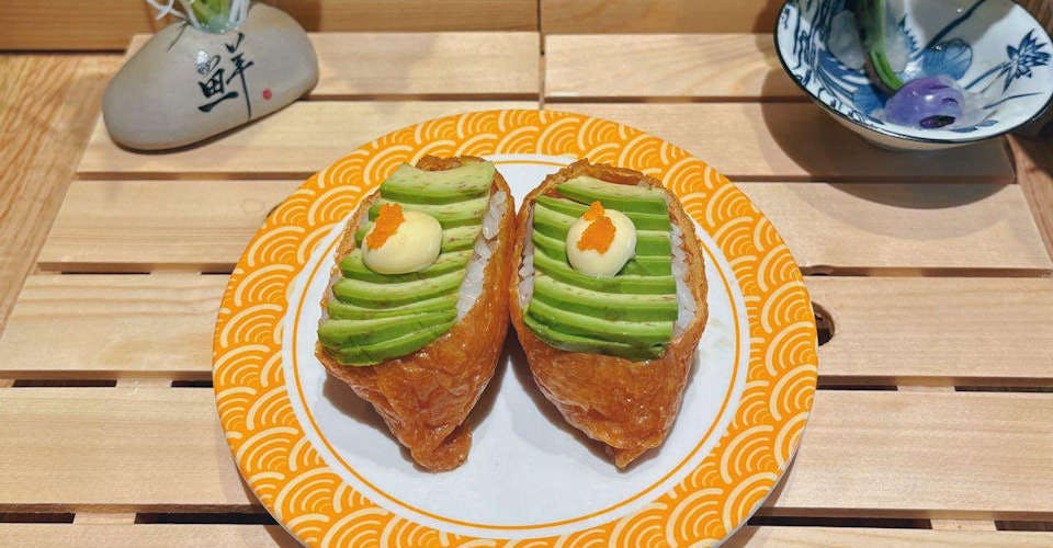 Inari Avocado Nigiri from Dodomi Sushi Rotary - N Sheridan Rd in Chicago, IL